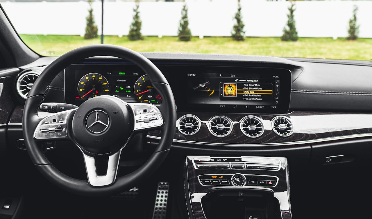 Explore the sleek and luxurious interior of a Mercedes Benz, showcasing advanced technology and design.